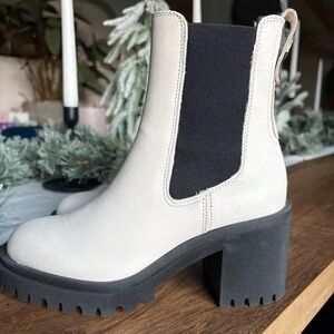 Elegant Black and White Heeled Boots